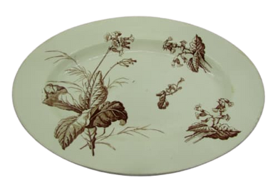 ancien plat terre de fer décor floral XIXème